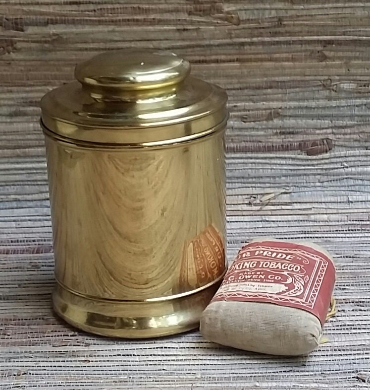 Brass Tobacco Canister Humidor Bag Full of Tobacco