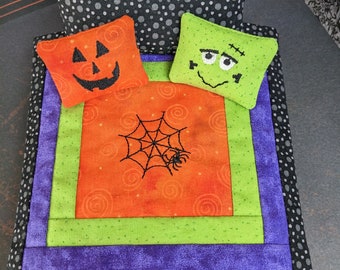 Miniature Halloween Quilt 1:12, Doll House, spider web, Frankenstein's Monster, Jack-o-Lantern. 1 large pillow and 2 smaller  pillows.