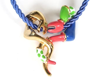 Artist jewelry : Dance of the snakes, gold plated pendant by Niki de Saint Phalle + perfume bottle, vintage / art, necklace, sculpture