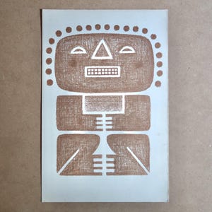 May include: A brown and white abstract illustration of a figure with a rectangular head, a triangular nose, and a rectangular mouth. The figure has a rectangular torso and legs. The head is surrounded by small brown circles.