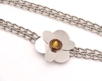 LINE VAUTRIN school : chain belt with talosel decor on the buckle, 1970s or 1980s / jewelry, French mode