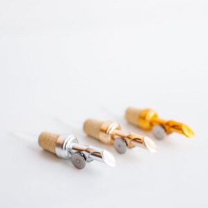 Pour Spouts in Silver, Light Gold and Gold.