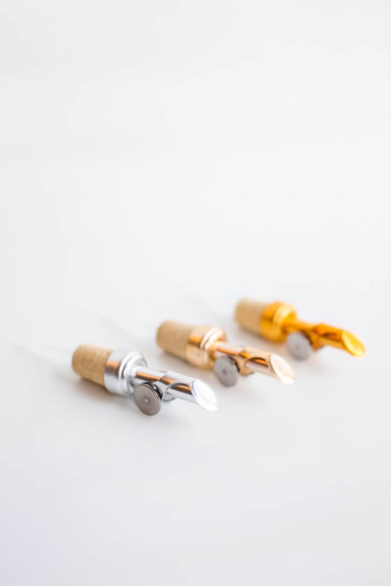 Pour Spouts in Silver, Light Gold and Gold.