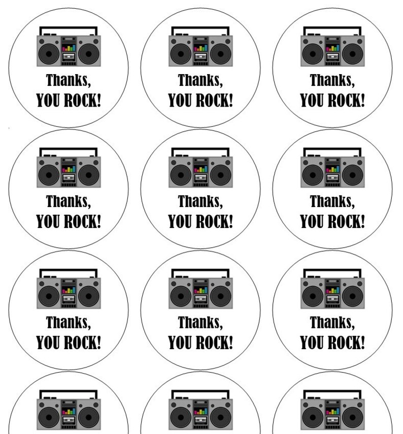 May include: Nine round white stickers with a black and grey boombox graphic and the text "Thanks, YOU ROCK!" printed in black.
