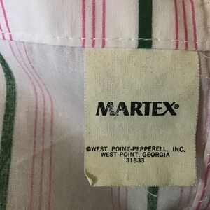 May include: White and pink striped fabric with a green stripe. A white tag with black text reads "MARTEX" and "WEST POINT-PEPPERRELL, INC. WEST POINT, GEORGIA 31833"
