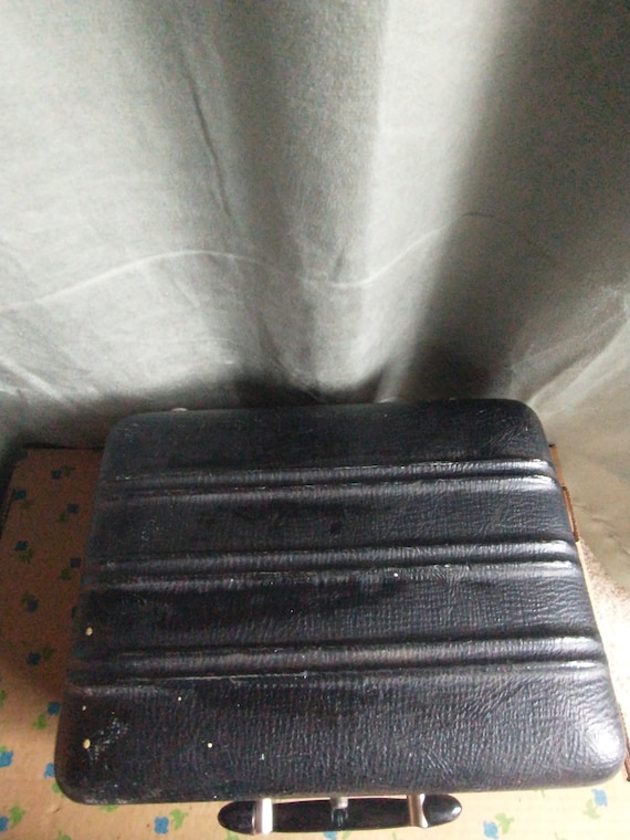 Small black vintage suitcase