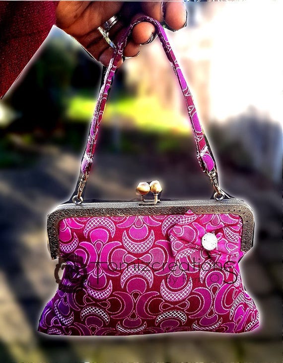 deep pink clutch bag
