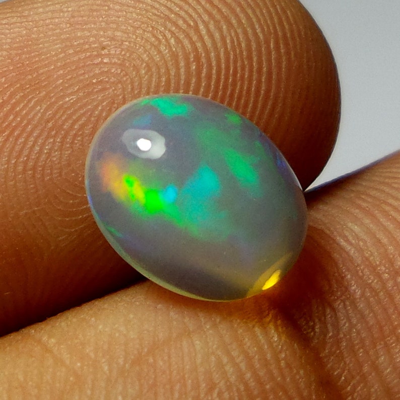 2 Carat 11.2X8.9X5.1 MM AAA Grade Natural Ethiopian Welo Fire Opal Oval Shape Cabochon Multi Color Opal