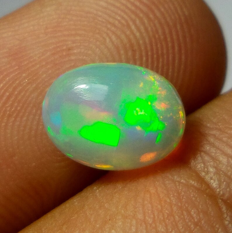 Multi Color Welo Fire Opal Cabochon 1.53 Carat 10.1x7.6x3.9 MM AAA Grade Natural Ethiopian Welo Fire Opal Oval Shape Cabochon