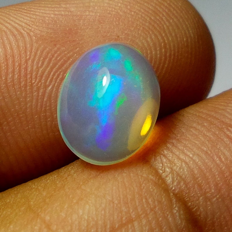 2 Carat 11.2X8.9X5.1 MM AAA Grade Natural Ethiopian Welo Fire Opal Oval Shape Cabochon Multi Color Opal