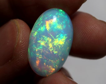 10.2 Carat 22.5x14.3x6.7 MM Natural AAAA Grade Rainbow Flashy Fire Ethiopian White Opal Oval Shape Cabochon For Pendent/Ring