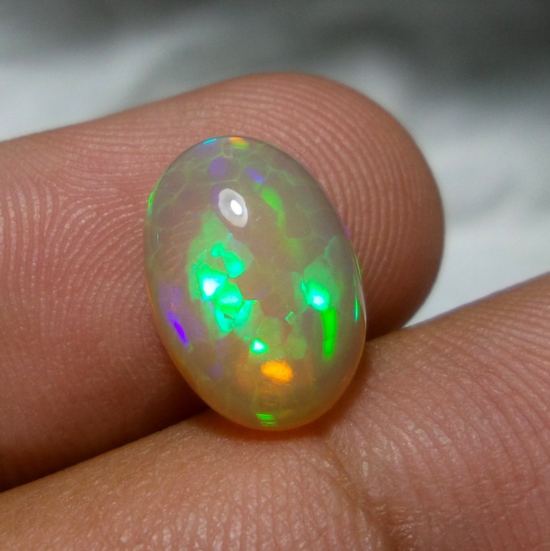 1.35 Cts 7X10 MM Natural Black Ethiopian Opal Cabochon Shape Oval Rainbow Fire Celebrated Opal Welo Fire Smooth Gemstone Opal Cabs Ring