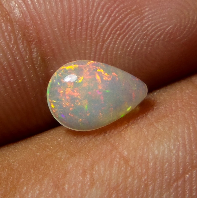 0.92 Carat 9.8x6.8x3.3 MM Rare Quality Ethiopian Multi Color Opal Pear Shape Cabochon