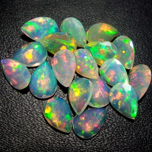 7x5 MM Natural Top Grade Multi Color Rainbow Fire Ethiopian Opal Faceted Pear Shape Gemstone Wholesale, 5x7 MM Multi Flash Fire Welo Opal