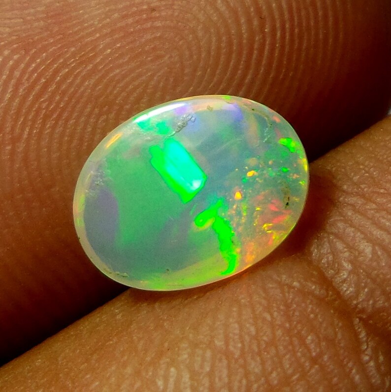 Multi Color Welo Fire Opal Cabochon 1.53 Carat 10.1x7.6x3.9 MM AAA Grade Natural Ethiopian Welo Fire Opal Oval Shape Cabochon