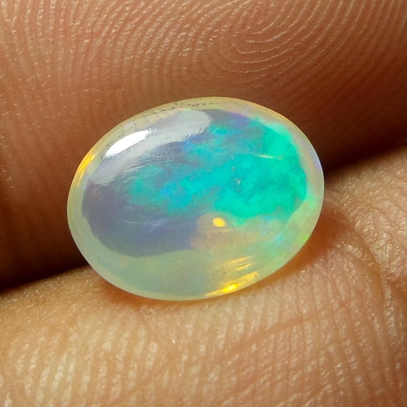 2 Carat 11.2X8.9X5.1 MM AAA Grade Natural Ethiopian Welo Fire Opal Oval Shape Cabochon Multi Color Opal
