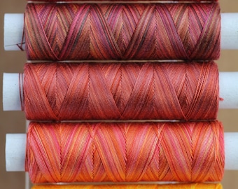 Hand Dyed Cotton machine thread, Colour Tequila Sunrise, Red, Orange, Yellow