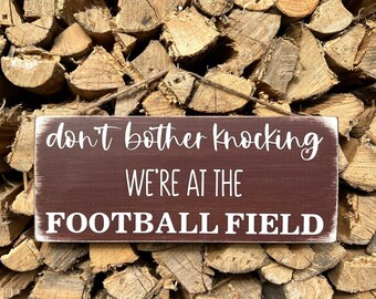 Don’t bother knocking, football sign, at the football field