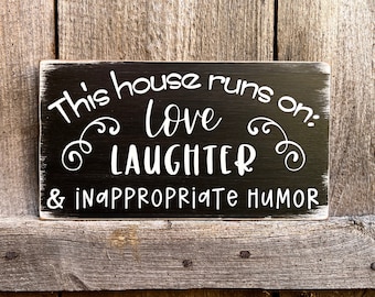 This house runs on, love laughter and inappropriate humor, funny sign