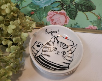 Bonjour-schaaltje kattensnuisterij: ringhouder met Franse decoratie