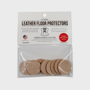 May include: A package of round, tan leather floor protectors. The packaging reads "Leather Floor Protectors" and "Made in USA." The protectors are designed to be a premium alternative to felt pads and are peel and stick adhesive.