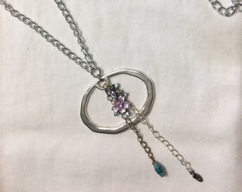 Long-Hanging Pendant Horizontal Oval Ring with Pastel Details and Two Dangling Chain Strands