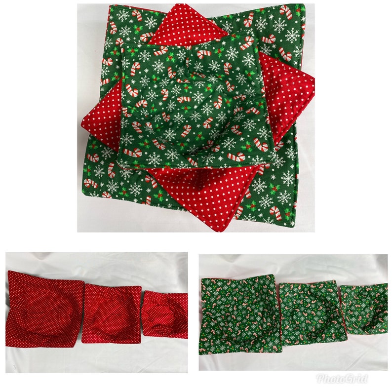 May include: Set of four green and red Christmas-themed fabric bowl cozies. The cozies are made of cotton fabric with a snowflake and candy cane pattern. The cozies are arranged in a pyramid shape.