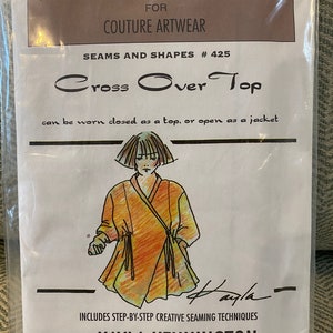 May include: A sewing pattern for a "Cross Over Top" from the "Modular Design" series for couture artwear. The pattern includes step-by-step instructions for creative seaming techniques. The pattern is designed by Kayla Kennington.