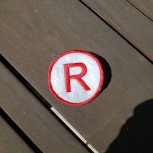 A League of Their Own Rockford Peaches "R" Hat Patch