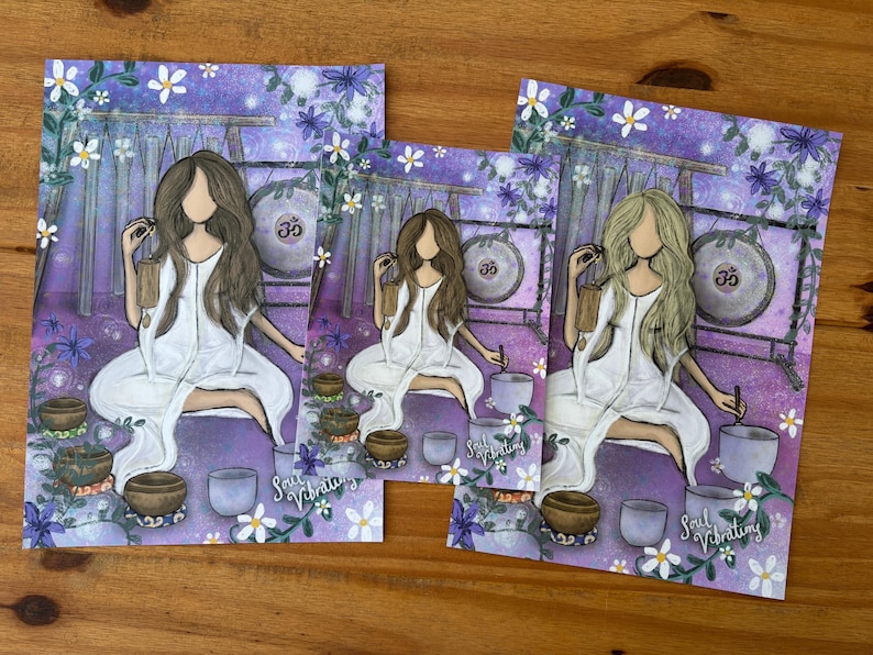 May include: Three art prints featuring a woman in a white dress meditating with singing bowls and a gong. The background is purple with floral accents. The text "Soul Vibrating" is visible on the prints.