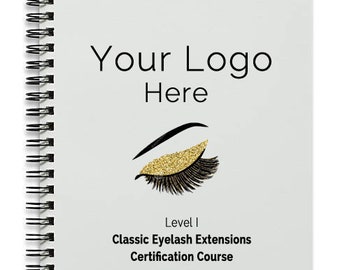 May include: A grey and white spiral bound student training manual for a Level I Classic Eyelash Extensions Certification Course. The cover features a stylised illustration of an eye with gold glitter eyeshadow and black eyelashes. The text "Your Logo Here" is at the top of the cover.