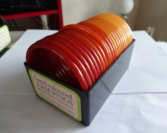 Vintage Box of 23 Buch and Deichmann designed by Ketty Dalsgaard    Shades of Orange Plastic Bangles