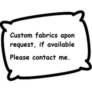 May include: A white pillow-shaped graphic with a thick black outline. The text inside reads: "Custom fabrics upon request, if available. Please contact me."