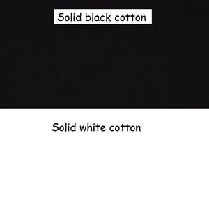 May include: The image displays two sections of fabric. The top section is solid black cotton, and the bottom section is solid white cotton. Text on the image reads "Solid black cotton" and "Solid white cotton".