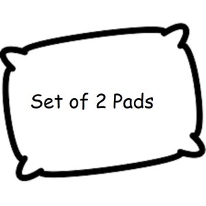 Puede incluir: Una almohada blanca con un contorno negro, con el texto "Set of 2 Pads". La almohada tiene forma rectangular con esquinas redondeadas. La imagen es simple y limpia, adecuada para varios listados de productos.