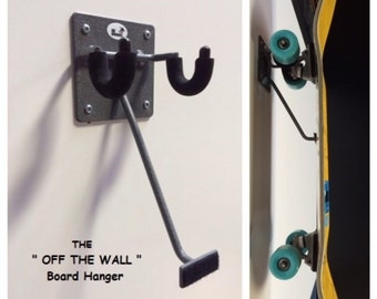 DKMounts    " Off The Wall "  Skateboard hanger.  The DKM-4 keeps board off the floor and wheels off the wall.