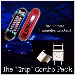 May include: The "Grip" Combo Pack includes two skateboard wall mounts and two white metal brackets. The ultimate in mounting brackets! The skateboards are red and black with the word "SUPREME" printed on one of them.