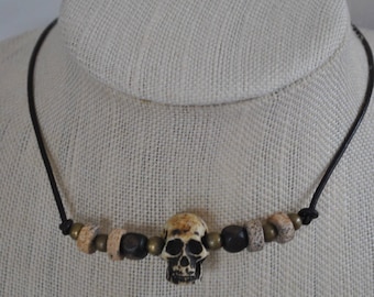 Men's skull necklace on leather, rugged, masculine