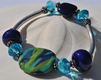 Vibrant Teal and Navy Blue African Kazuri Ceramic, crystal and sterling silver bracelet