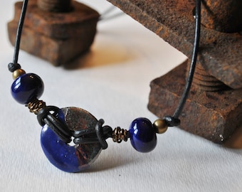 Men's Necklace of cobalt blue Raku ceramic pendant and cobalt blue beads on black leather cord
