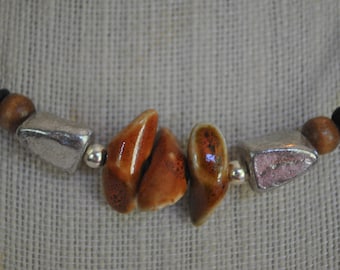 Men's rust ceramic necklace on leather with wooden and silver nugget beads,