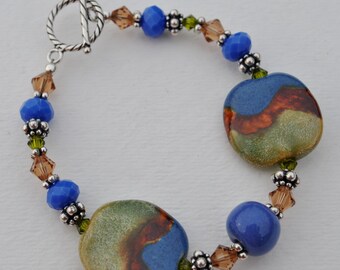 Chunky  Sage, brown, and blue African Kazuri Ceramic bracelet set with Swarovski crystals and Bali sterling silver beads