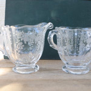 Vintage set of creamer and sugar etched glass