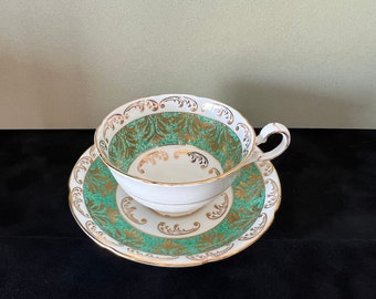Filiżanka do herbaty i spodek z porcelany kostnej Royal Grafton: miętowo-zielony, złoty filigran