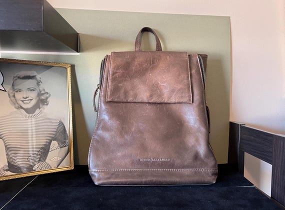 derek alexander leather flap backpack Buy Sling Backpack, Black, One Size at 18.5 drop Vintage Leather Bag Backpack Bookbag