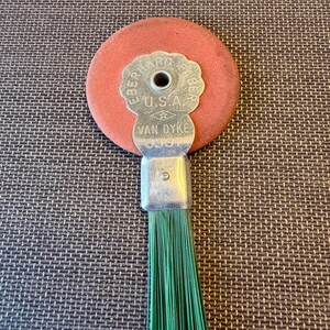 May include: A rustic wooden sign with the text "Welcome to our home" in white lettering. The sign features a distressed finish and a simple, inviting design, perfect for front door decor.