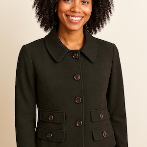 May include: A dark green blazer with a collared neckline and four brown buttons. The blazer has two front pockets on each side and is made of a textured fabric. The jacket is a classic style.