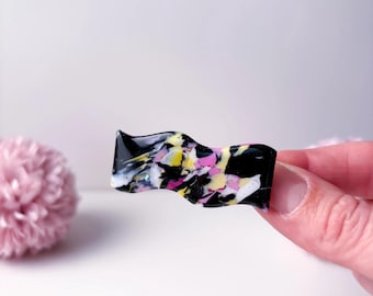Barrette à cheveux noire, rose et jaune