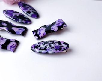 Barrettes à cheveux noires et violettes