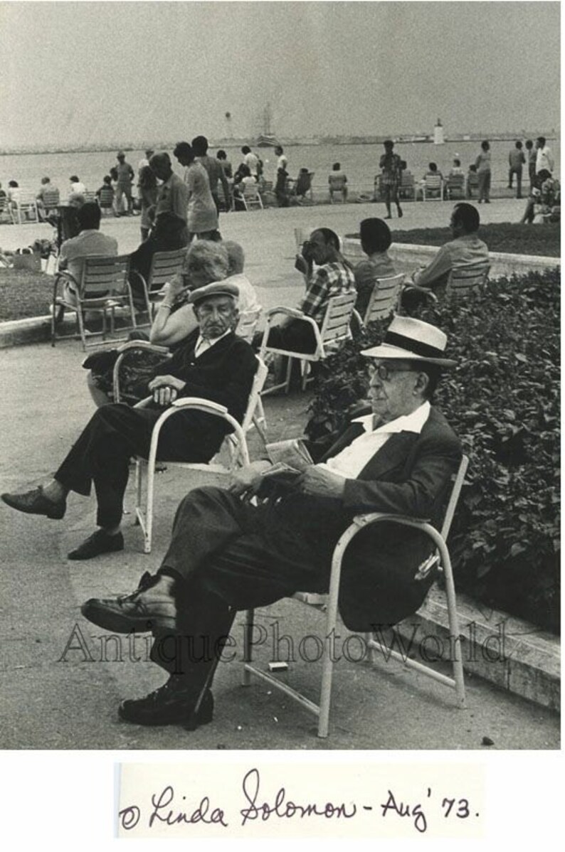 People resting in bay park marina vintage art photo by L Solomon